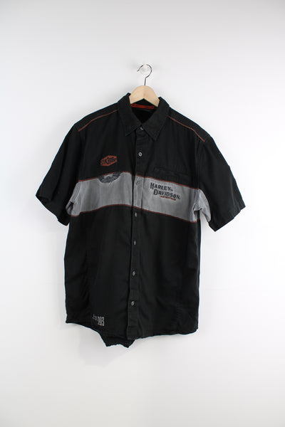 Harley Davidson Short Sleeved Shirt in a black and grey colourway, button up with a chest pocket, and logos embroidered throughout as well as big spell out on the back.