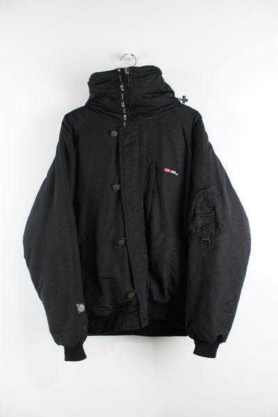 All black Diesel real down bomber style puffer jacket with multiple pockets and removable fur trim hood.