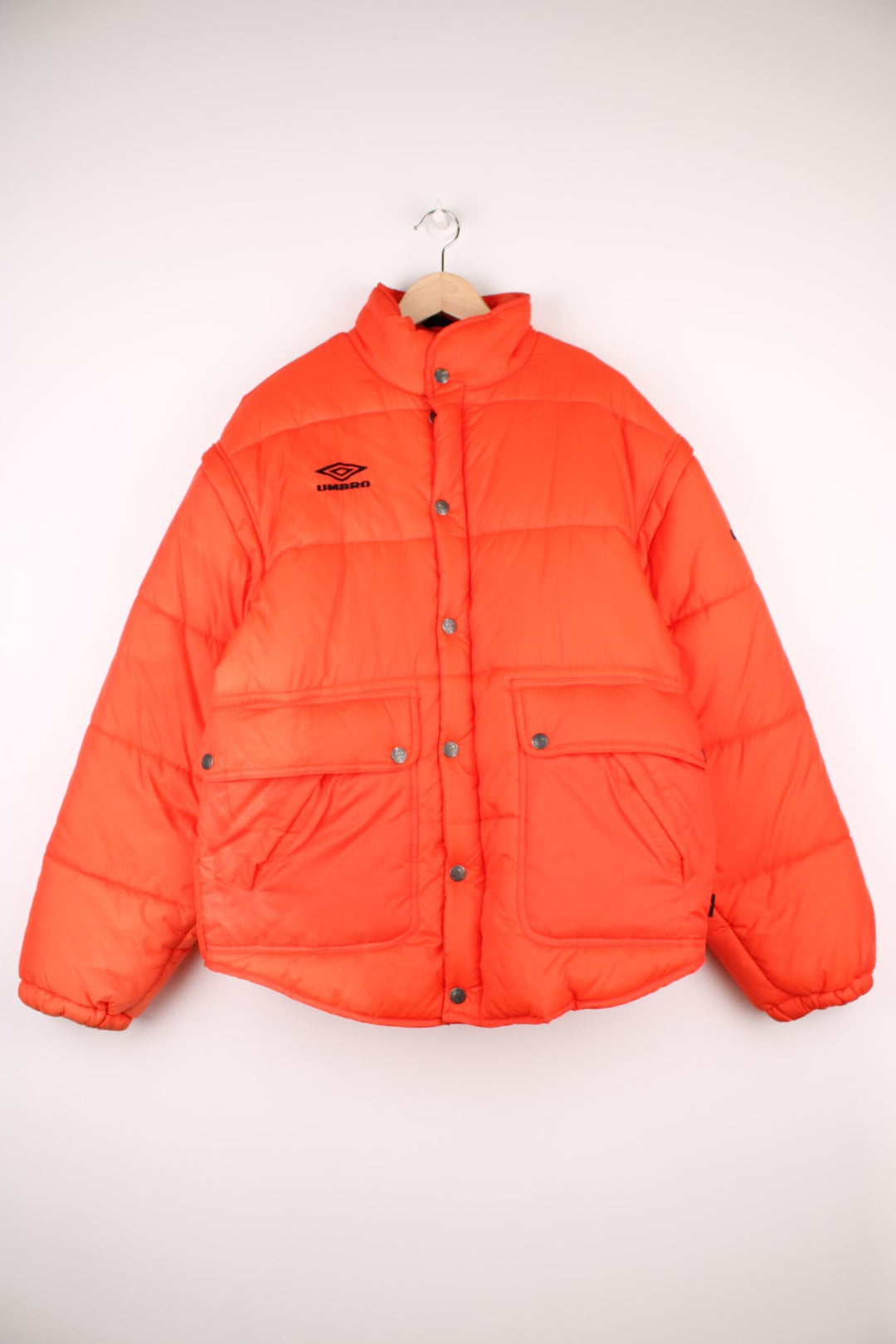 Vintage orange Umbro puffer coat / gilet with embroidered logo on the chest and removable sleeves.