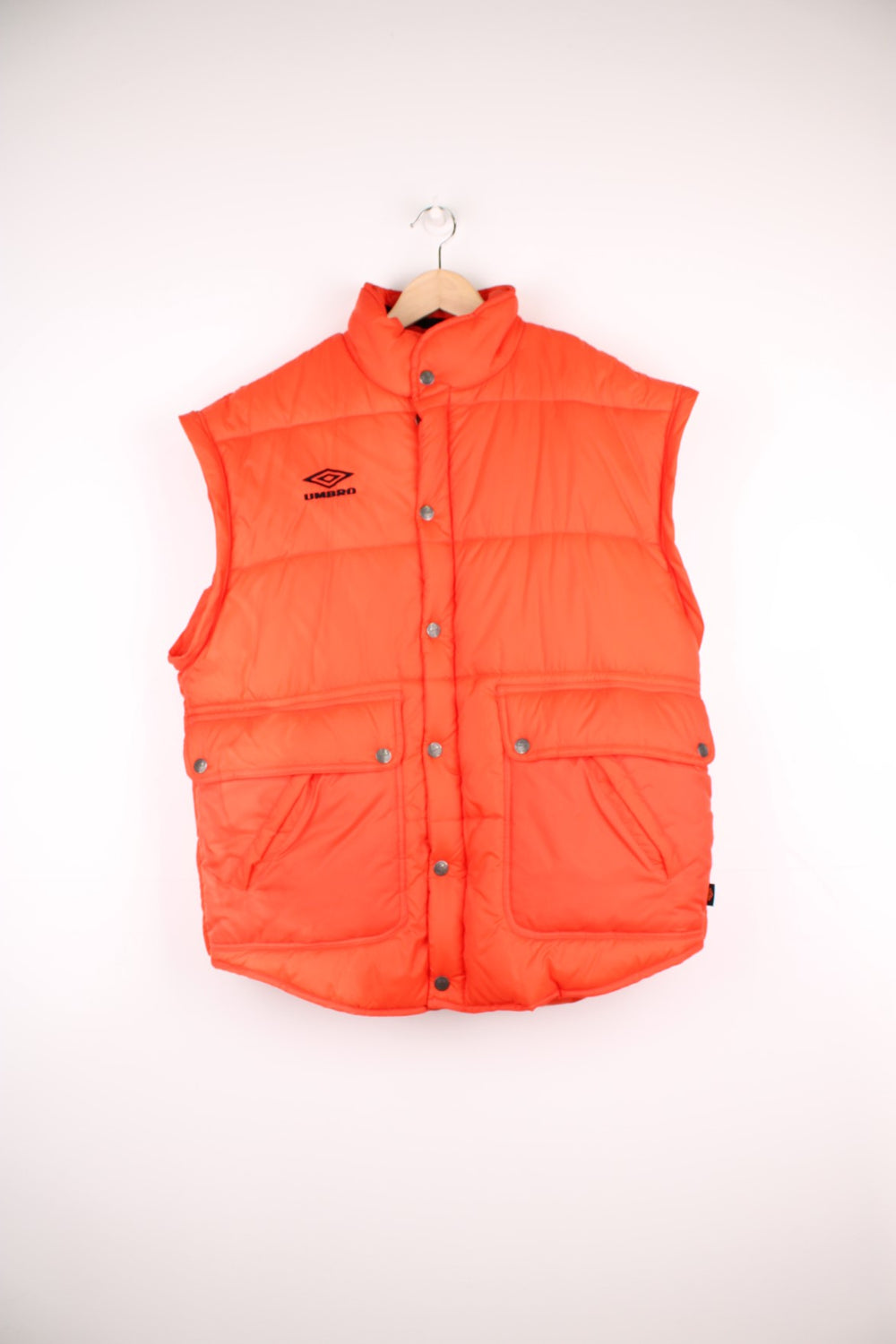 Vintage orange Umbro puffer coat / gilet with embroidered logo on the chest and removable sleeves.