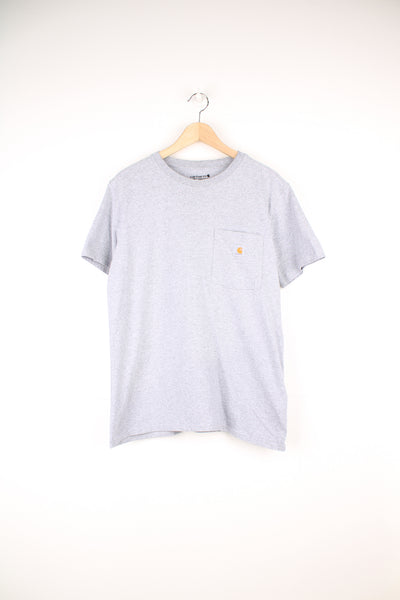 Carhartt T-Shirt in a grey colourway, has a chest pocket with the logo embroidered on it.