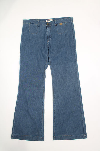 Diesel wide leg, mid rise jeans with signature logo on the pocket