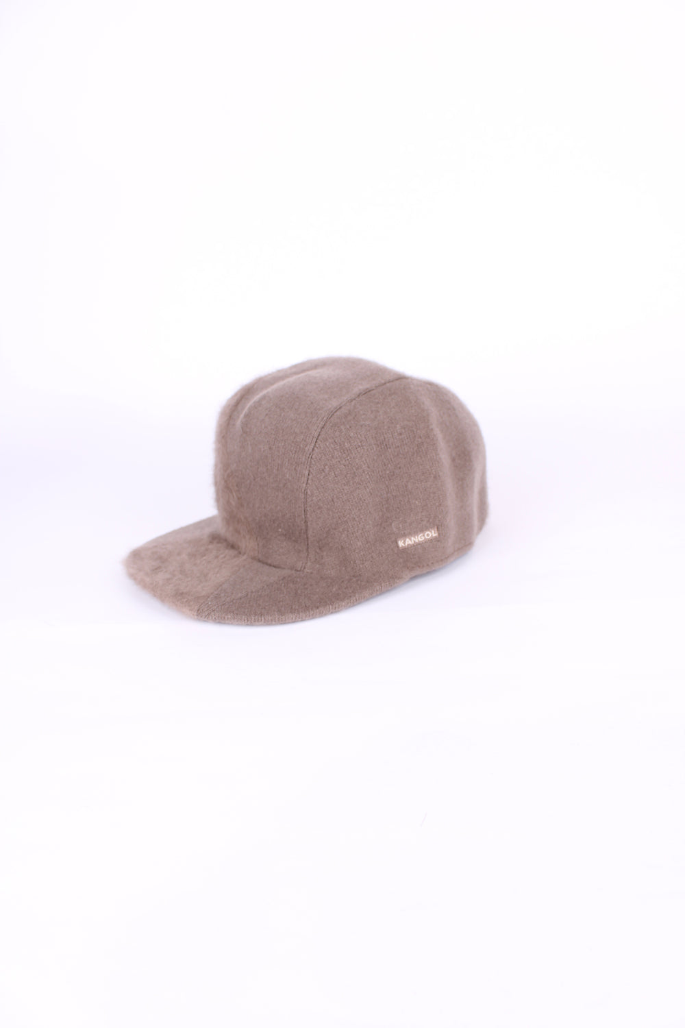 Kangol wool / furgora k / raw seams link cap in brown, has embroidered logo on the side.