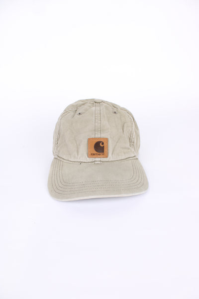 Carhartt Odessa cap in a tanned colour, 100% cotton, adjustable strap, has logos on the front and back. 