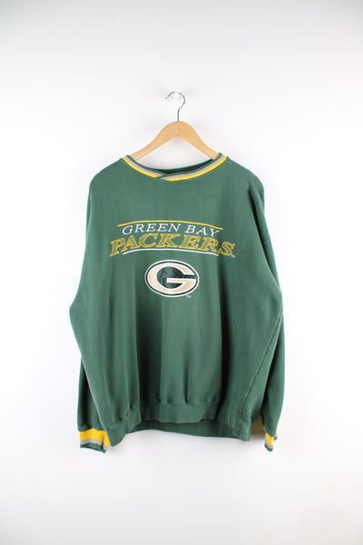 Vintage Green Bay Packers NFL, Starter sweatshirt in the green and yellow team colourway, embroidered spell out and logo across the front. 