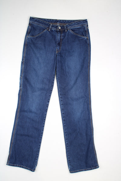 Diesel mid rise straight leg jeans. Carpenter style pocket on the side of one leg. good condition  Size in Label:  31