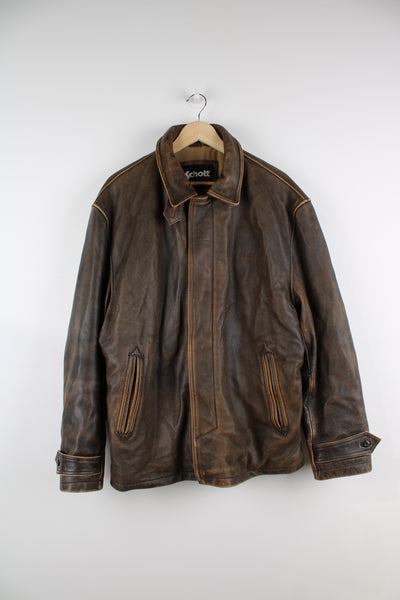 Vintage Schott NYC brown worn leather bomber jacket, closes with a zip and popper buttons.   good condition  Size in Label:   Mens L 