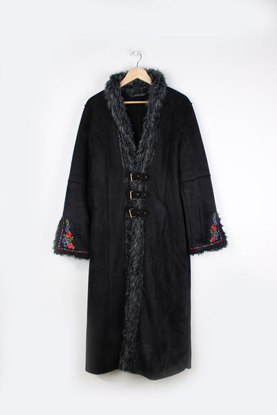 Vintage black Y2K faux sheepskin Afghan jacket with embroidered flowers on the front. Closes with buckles at the front and has faux fur lining. Made by Outline.  good condition - some faint marks on the hem (see photos)  Size on Label:  Women's L