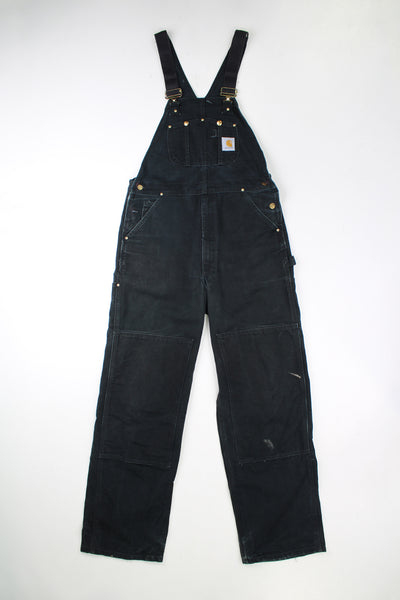 Vintage Carhartt black denim dungarees with double knee reinforcement.  good condition - marks on the legs (see photos)Size in Label: No Size Label - Measures like a Mens M