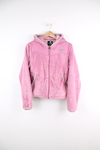 The North Face Hooded Fleece in a pink colourway, zip up, size pockets and has the logo embroidered on the front and back.