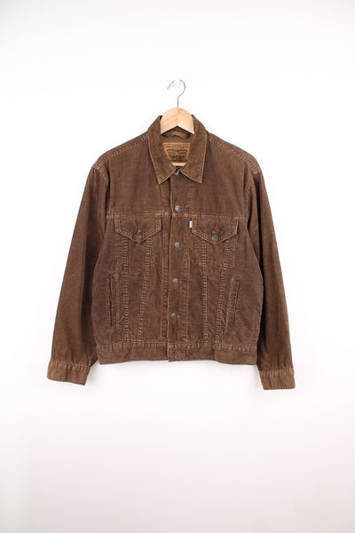 Vintage Levi Strauss brown corduroy button up trucker jacket features double pockets and signature branded tab  