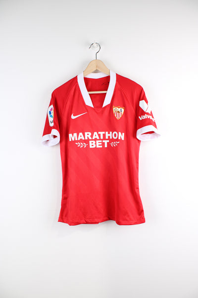 Sevilla 2020/21 Nike Away Football shirt, red and white colourway, Ivan Rakitic number 10 printed on back, as well as logos embroidered on the front. 
