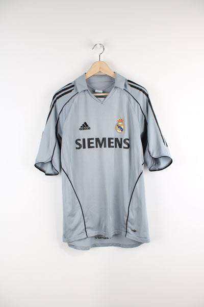 Vintage Real Madrid 2005/06, Adidas Third Football Shirt, grey and black colourway, v neck with a collar, and logos embroidered on the front.