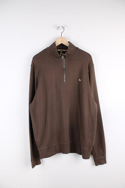 Burberry brown 1/4 zip sweatshirt features signature embroidered logo on the chest and high neck