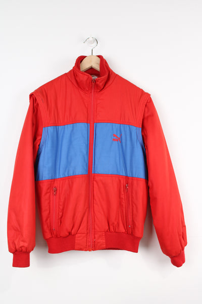 Vintage 1980's/90's Puma all red and blue padded zip through tracksuit jacket with embroidered logo on the chest. Features zip off sleeves