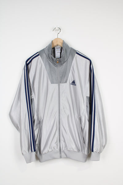 Vintage 90's Adidas grey satin tracksuit top with embroidered spell-out on the chest and three stripe details down the sleeve