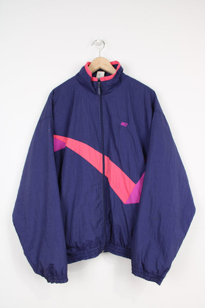 Vintage 1990s Nike purple zip through tracksuit top with embroidered swoosh logo on the chest
