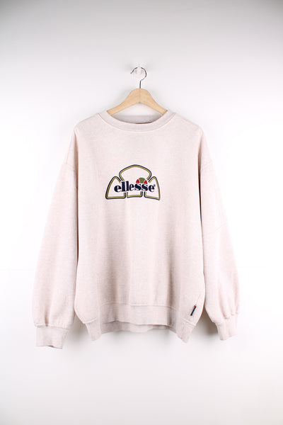 Vintage Ellesse tan crewneck sweatshirt, features embroidered spell-out logo on the chest 