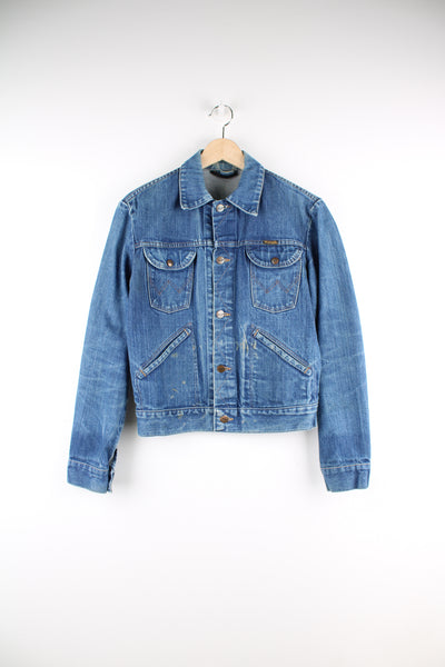 Vintage 1980's Wrangler blue denim button up trucker jacket with signature logo on the pocket 