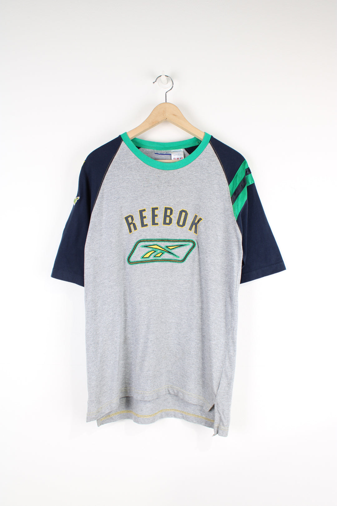 Vintage Reebok T-shirt, grey, blue and green colourway, crewneck, short sleeved and has embroidered logos on the front and sleeve