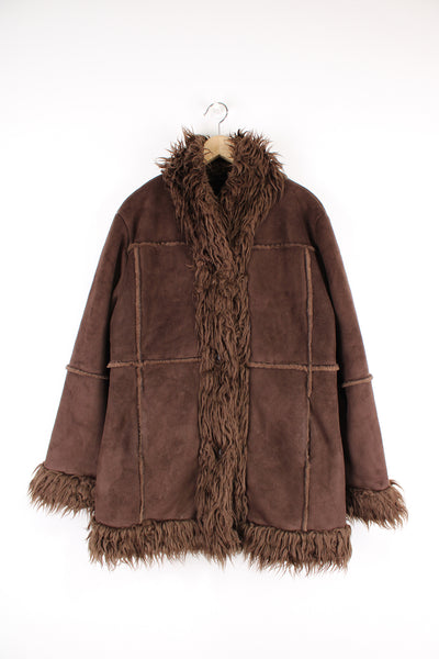 Vintage Y2K brown afghan coat made from faux sheepskin with faux fur trim. Closes with buttons. good condition  Size on Label:   16 - Measures like a Womens XL
