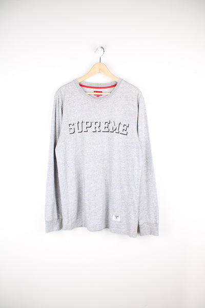 Supreme grey long sleeve t-shirt, features spell-out logo across the chest