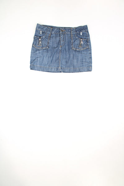 Vintage Y2K low rise denim mini skirt with utility style pockets ans silver hardware. The back pockets have metallic silver embroidery.  good condition  Size in label:   L - Measures more like a size M