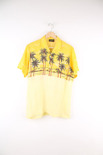 Vintage Hawaiian Shirt in a yellow colourway, palm tree island design printed on the front and back, button up and has a camp collar.