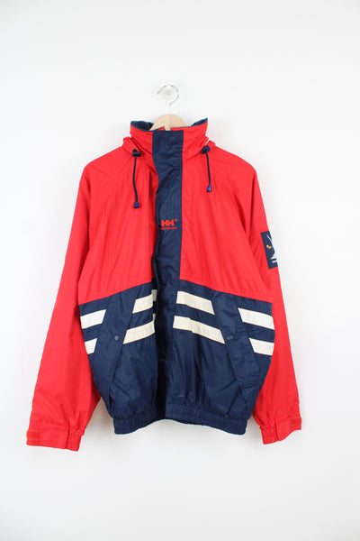 Helly Hansen red and blue zip through windbreaker jacket with embroidered logo on the chest