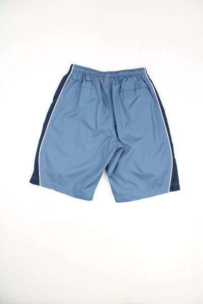 Nike Shorts in a blue colourway, pockets, adjustable waist, netted lining, and has the logo embroidered on the front.