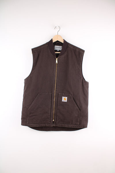 Carhartt WIP dark brown heavy duty cotton zip through gilet with quilted lining and embroidered logo on the pocket 