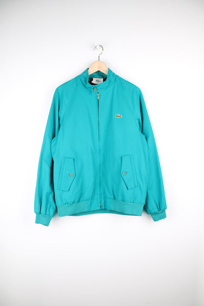 Vintage 90s turquoise Lacoste harrington jacket with embroidered logo on the chest. Features good condition Size in Label Mens M - Measures more like a S