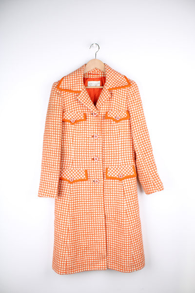 True vintage 1960's tapestry cream wool coat with orange grid design.  good condition  Size in Label:   No Size - Would estimate that it  would fit a Womens M best. 