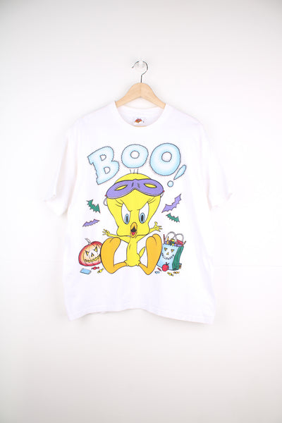 Vintage 90's single stitch Looney Tunes tee in white, features spooky Halloween Tweety Pie graphic on the front with glittery text 