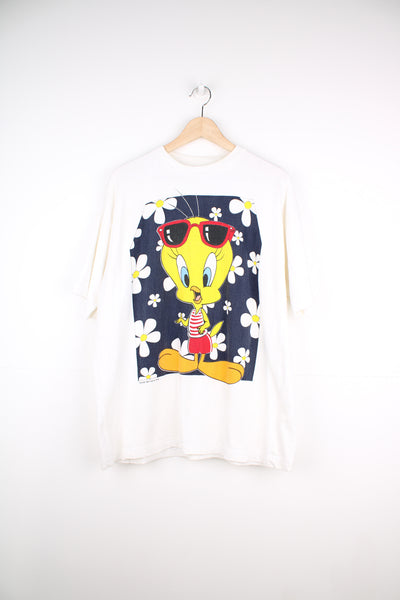 Vintage 90's Looney Tunes t-shirt in an off white, features a summery Tweety Pie graphic on the front 