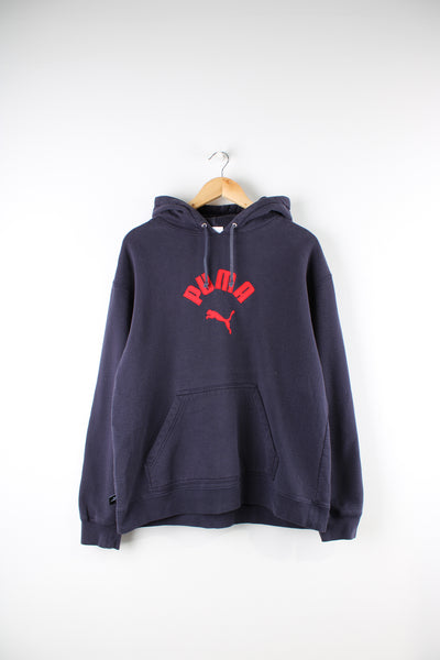Vintage Puma navy blue hoodie features red embroidered spell-out logo across the chest