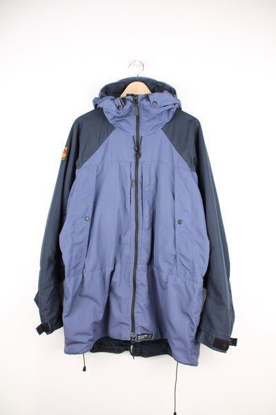 Paramo Nikwax Analogy Jacket in a blue colourway, zip up, multiple pockets, hooded and has the logo embroidered on the front and right sleeve.