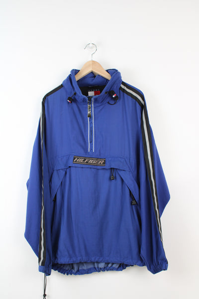 Tommy Hilfiger 1/4 zip windbreaker / lightweight foldaway jacket with embroidered logo on the chest