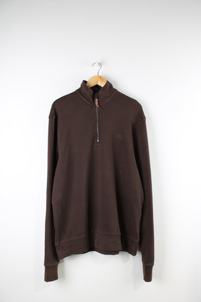 Burberry brown 1/4 zip sweatshirt features signature embroidered logo on the chest, elbow pads and high neck