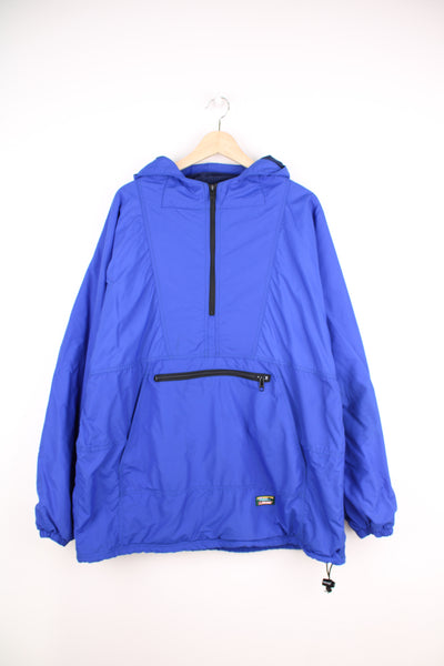 L.L. Bean Anorak Jacket in a blue colourway, half zip, big pouch pockets, fleece lining, hooded, and has the logo embroidered on the front.