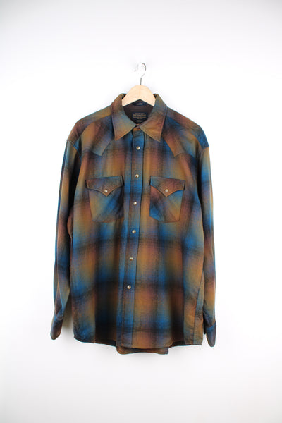 Pendleton 100% wool brown/blue plaid shirt with pearl snap buttons and western yoke on the front and back 