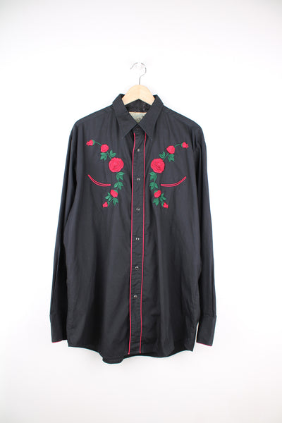 Vintage western shirt by Roper, features embroidered roses, red piping, smile pockets, dagger collar and snap buttons