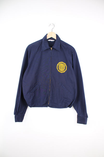 Vintage looks like 70's navy blue zip through American Legion cotton cropped bomber jacket with printed badge on the chest and spell-out 'Carson Valley Post #11' on the back  