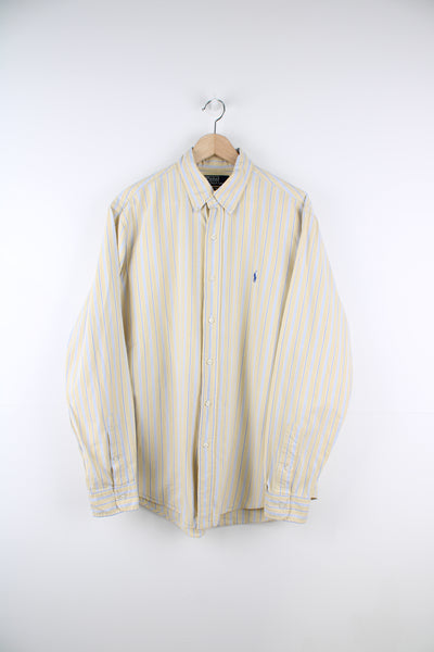 Ralph Lauren Shirt in a yellow, white and blue striped colourway, button up and has the logo embroidered on the front.
