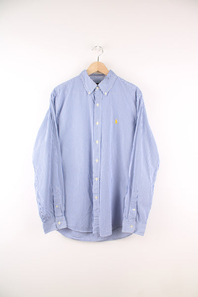Ralph Lauren Shirt in a blue and white striped colourway, button up and has the logo embroidered on the front.