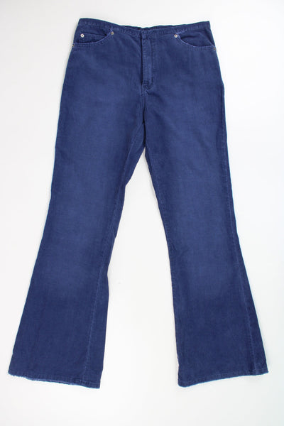 Vintage N.L Jeans blue flared corduroy trousers with raw edge cuffs and pockets