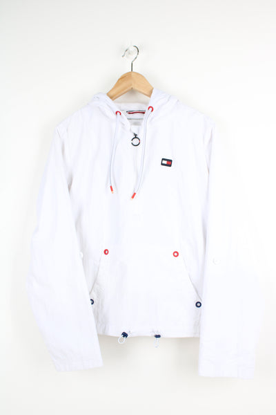 Tommy Hilfiger all white 1/4 zip track jacket with signature logo on the chest and drawstring hem