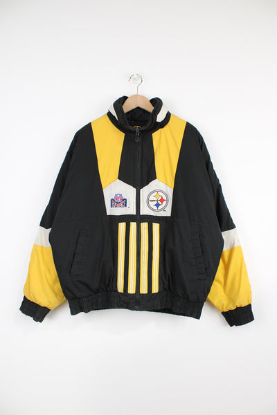 Vintage 90s reversible black and yellow Pittsburgh Steelers bomber jacket. Made by Pro Player. Side one features black yellow and white paneling with embroidered logos on the chest and back. This side has some faint marks throughout, mostly on the sleeves (see photos)