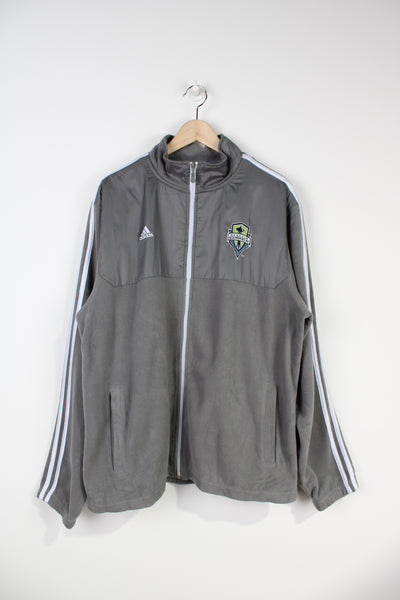 Seattle Sounders F.C grey zip through fleece by Adidas with embroidered badges on the chest