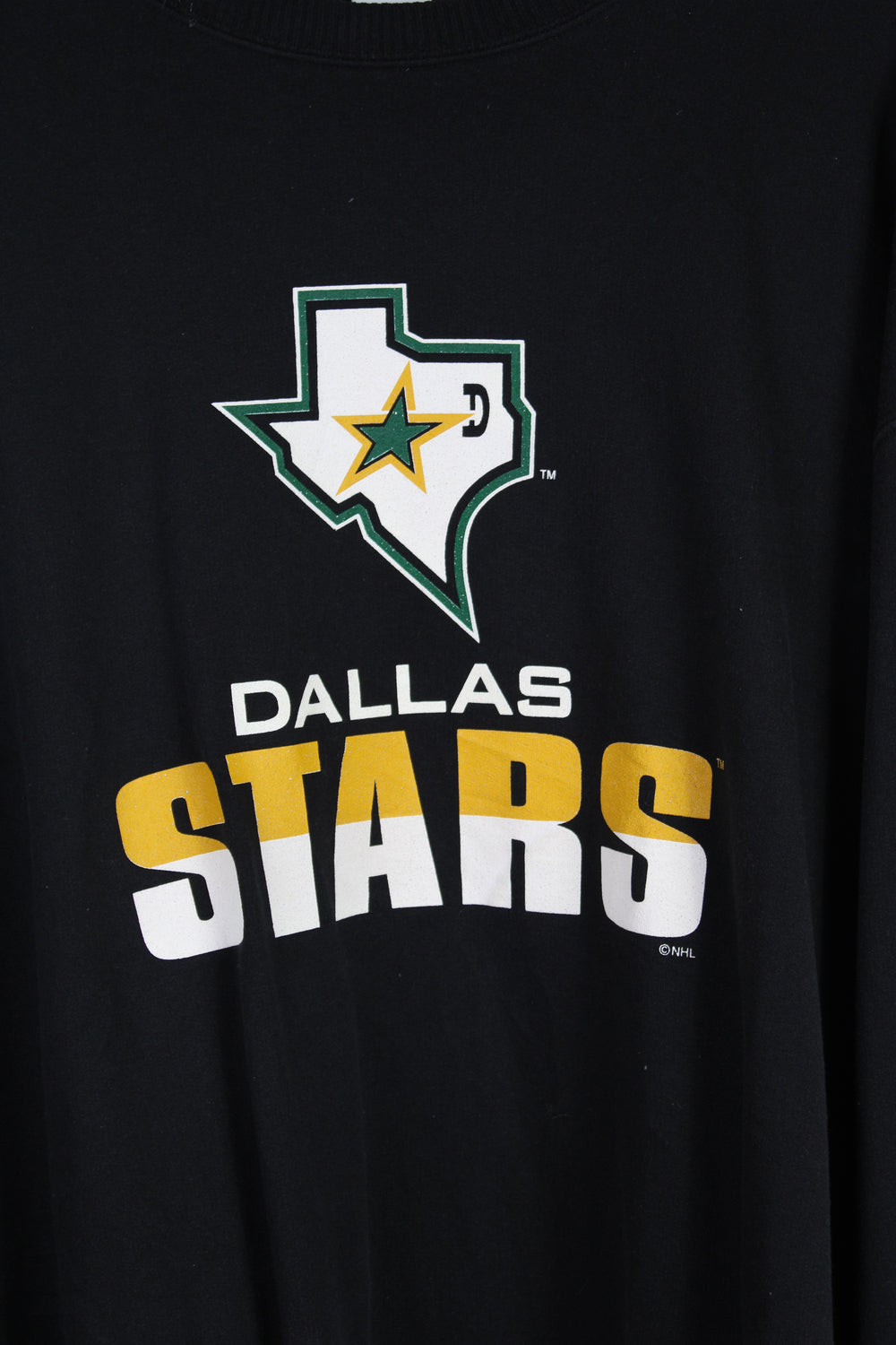 Dallas Stars black sweatshirt by CCM with printed spell-out graphic on the front